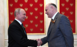 Аслан Бжания и Владимир Путин обменялись поздравлениями с Днем Победы в ВОВ